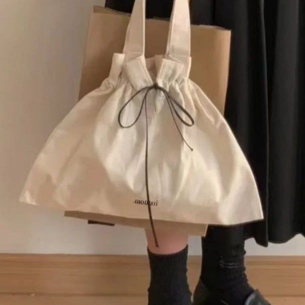 The Mon Oui Mini Canvas Bag